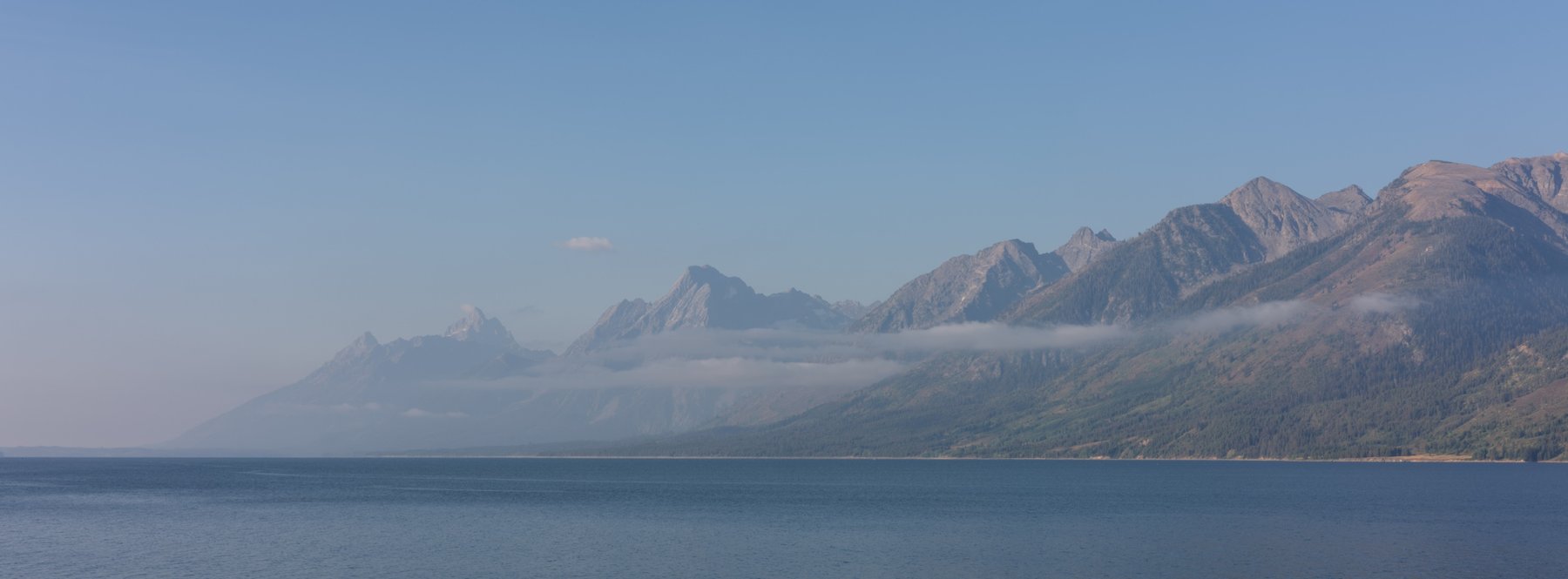 Mountain range above a calm lake
