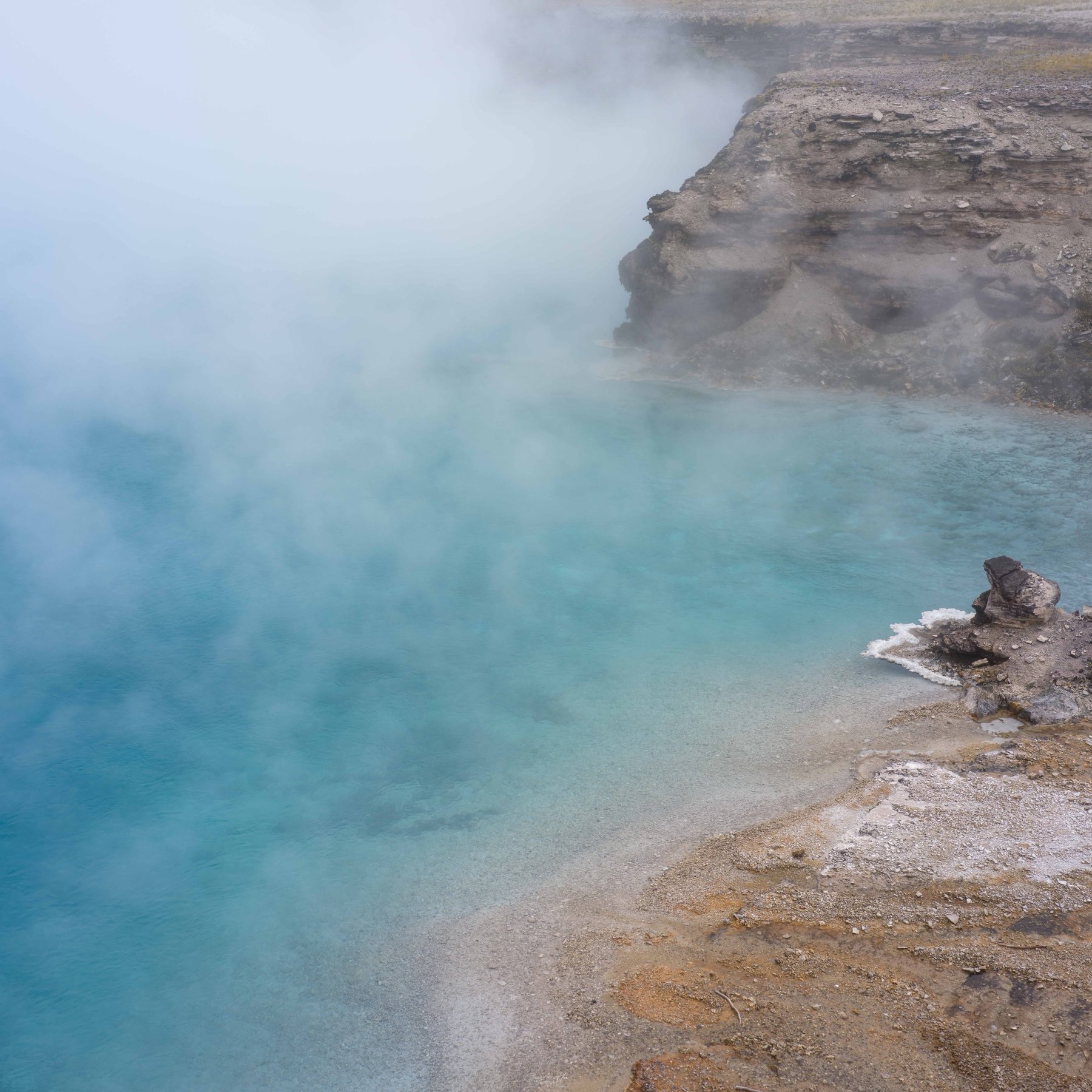 Steaming blue hot spring